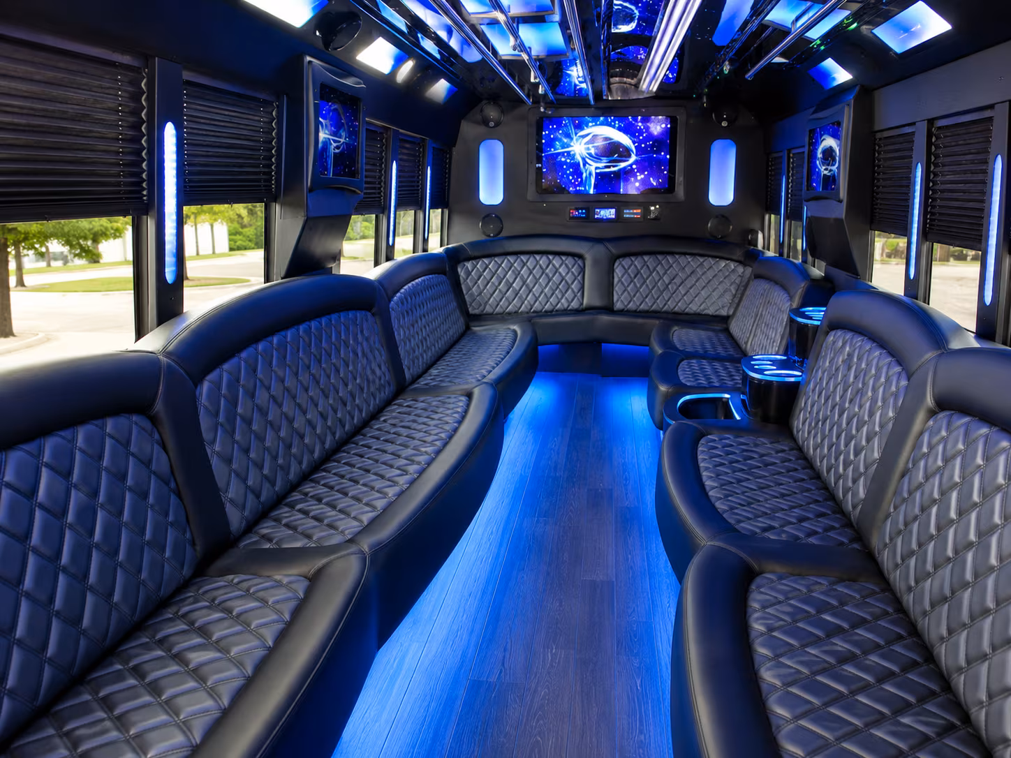 Group beside a Mercedes Sprinter limo in Corona